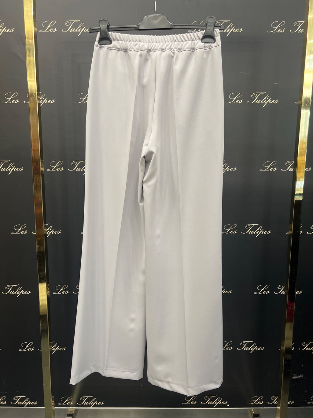 PANTALONE A PALAZZO, TASCHE E L’ELASTICO SUL RETRO IN VITA - GRIGIO